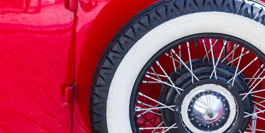 Image of a classic car wheel. 