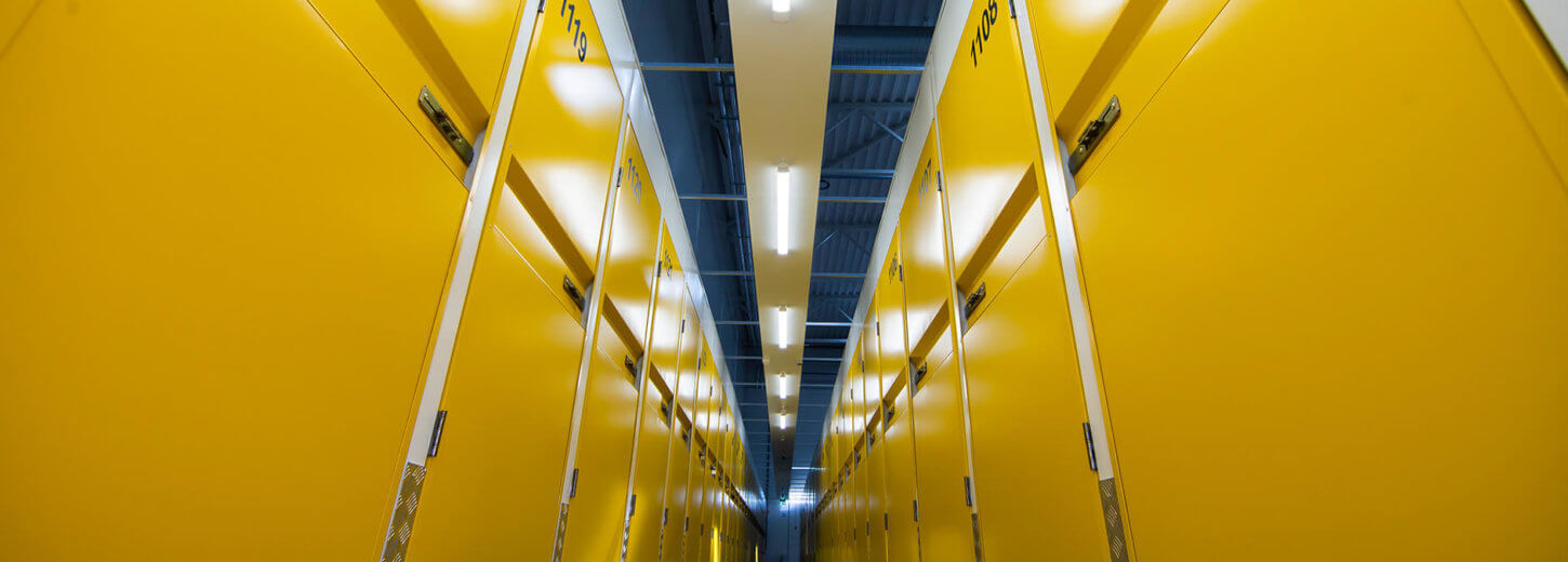 Corridor with lots of doors to storage containers