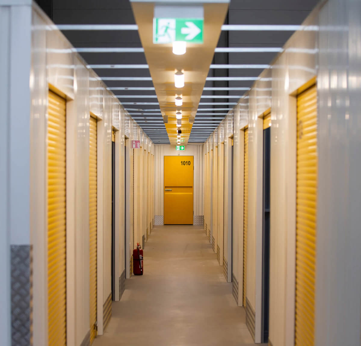 Corridor with lots of doors to storage containers