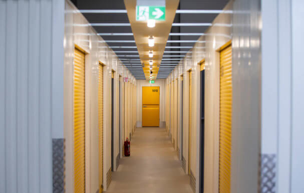 Corridor with lots of doors to storage containers