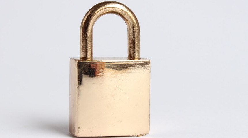 Image of gold coloured padlock.