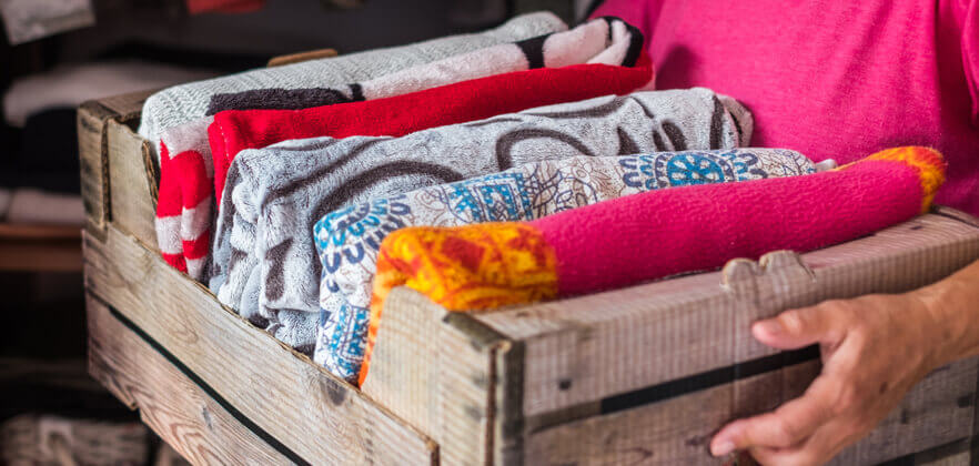 Image of a tidy organised bedroom draw with clothes packed in neatly.