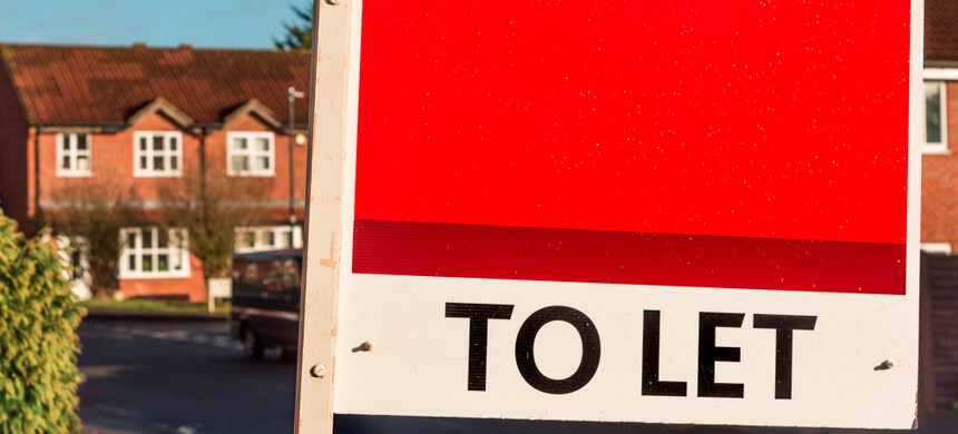 Image of to let sign outside house.