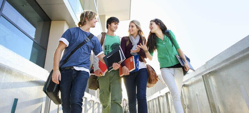 Image of university students talking together.