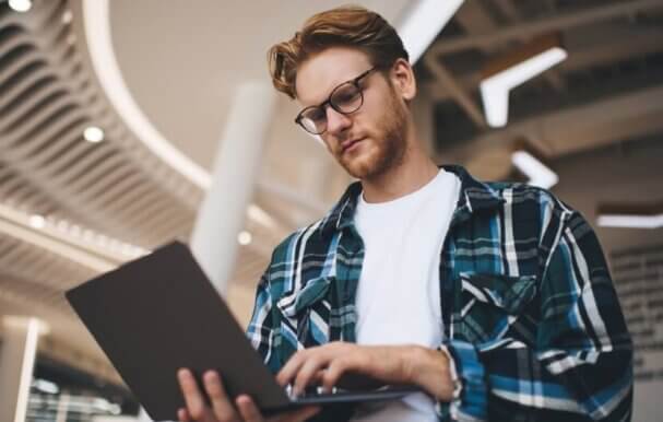 Image of a student in the library.